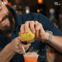 Bartender Making A Drink GIF - Bartender Making A Drink Lemon GIFs