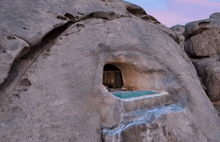 a cave with a swimming pool in it