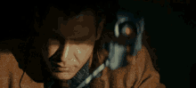 There'S Something About Her Eyes GIF - Blade Runner Harrison Ford Camera GIFs