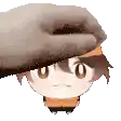 a hand is putting a hat on a cartoon character .