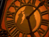 a clock with roman numerals on it is lit up
