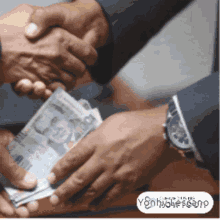 two people shaking hands over a stack of money with a watermark that says yonhlovescano