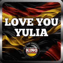 a sign that says " love you yulia " with a german flag in the background
