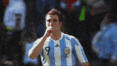 a soccer player wearing a jersey with the number 9