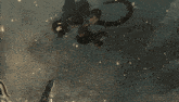 a blurred image of a city with a clock tower in the distance