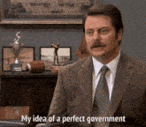 a man in a suit and tie is saying my idea of a perfect government