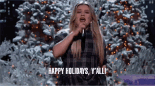 Happy Holidays Yall Kelly Clarkson GIF - Happy Holidays Yall Kelly Clarkson Rockefeller Christmas GIFs