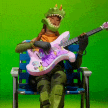 a dinosaur is playing a guitar while sitting in a chair .