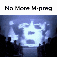 a group of people are looking at a screen that says no more m-preg
