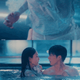 a man and a woman are holding hands in a pool with the letters annej on the bottom left