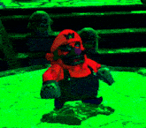 a pixelated image of mario standing in front of ghosts with the letter w on his hat