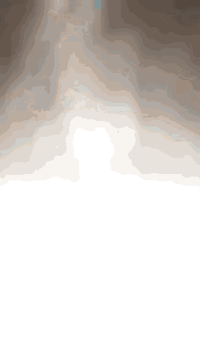 a blurred image of a cloudy sky with a few spots of light