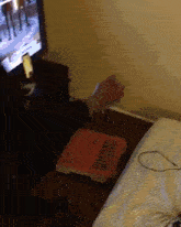a pizza box that says delivery delivery sits on a table