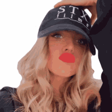 posing with hat anne winters pouty lips posing fixing cap