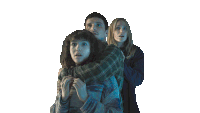 a man and two women are hugging each other in a dark room with a white background