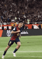 a soccer player with the number 8 on his shirt