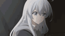 a girl with long white hair and blue eyes looks at the camera
