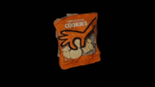 a bag of chips with a hand on it that says cookies