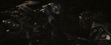 a robot says " oh cool you 're still alive " in a dark room