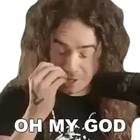 a man with long hair is wearing a black shirt and says oh my god
