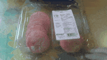 a package of pink cupcakes with a label that says abby