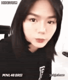 a close up of a woman 's face with the words honeycam on the top