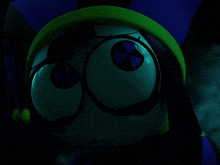 a cartoon character with big eyes and a blue hat
