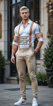 a man wearing suspenders and a shirt that says apple lunch goodnight is standing in front of a building