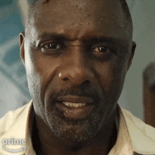 a close up of a man 's face with the word prime on the bottom left
