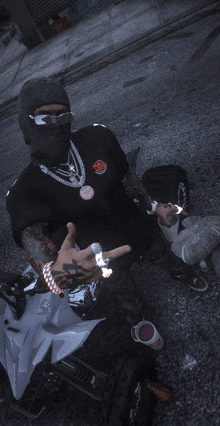 a man wearing a black shirt that says ' supreme ' on the front