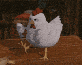 a chicken with a scarf around its neck is sitting on a table