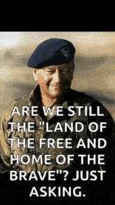 a man in a military uniform with a quote on it .