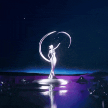 a statue of a woman with a crescent moon in her hand