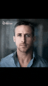 a close up of a man 's face with the word revive on the bottom right