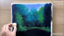 a painting of a forest is being made by animatica