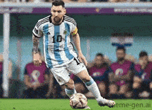 a soccer player with the number 10 on his jersey is kicking the ball