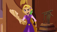 rapunzel from tangled is holding a piece of paper and a green lizard on her shoulder