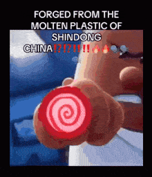 a man is holding a red object with a swirl on it and the words forged from the molten plastic of shindong