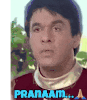 a close up of a man 's face with the words pranaam written on the bottom