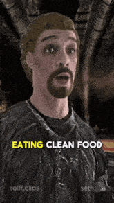 a man with a beard is wearing a black jacket and says eating clean food