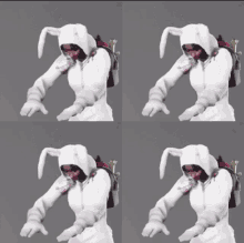 a woman in a bunny costume is dancing with her arms up