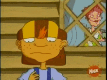 a cartoon character is standing in front of a window with a nick logo on the bottom right corner .
