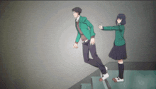a boy and a girl are standing on stairs