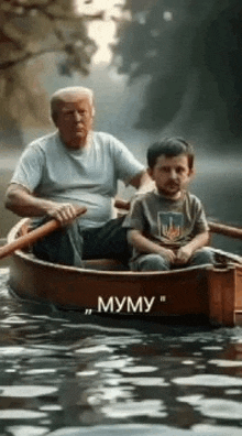 an elderly man and a young boy are rowing a boat in the water .