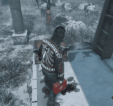 a man in a sweater with the letter x on the back