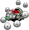 a pixel art drawing of a robot with a red eggman inside of it surrounded by balls .