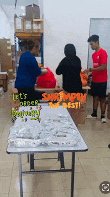 a group of people standing around a table with shrimp on it