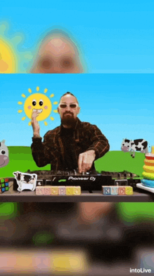 a man is playing a pioneer dj set