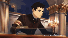 a man in a suit is sitting in a courtroom with a candle in front of him
