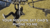 a person is hanging from a pole on a playground with the words `` your mission : get dad 's phone to me ''